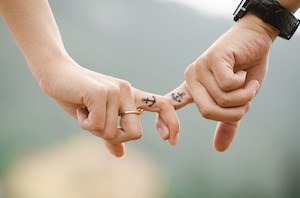 I love being married. Photo of couple holding hands